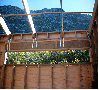 Figure 27 left: Site build roof system with galvanized metal tie downs