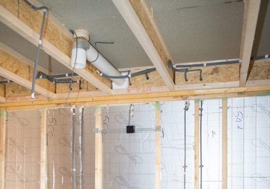 Figure 30: Plumbing and electrical services below moisture rated bathroom floor